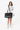 Model wearing the Sherpani Boston AT in Carbon on her right shoulder, facing the camera. #color_carbon