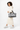 Model carrying the Sherpani Boston AT in Sakura on her left elbow, turning her body to the left. #color_sakura