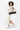 Model wearing the Sherpani Boston AT in Straw on her left shoulder, turned slightly to the left. #color_straw