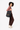 A model carries Sherpani three-in-one bag, the Camden in Chromatic, as a tote. #color_chromatic