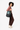 A model carries Sherpani three-in-one bag, the Camden in St. Lucia, as a tote. #color_st-lucia