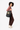 A model carries Sherpani three-in-one bag, the Camden in Ventura '73, as a tote. #color_ventura-73