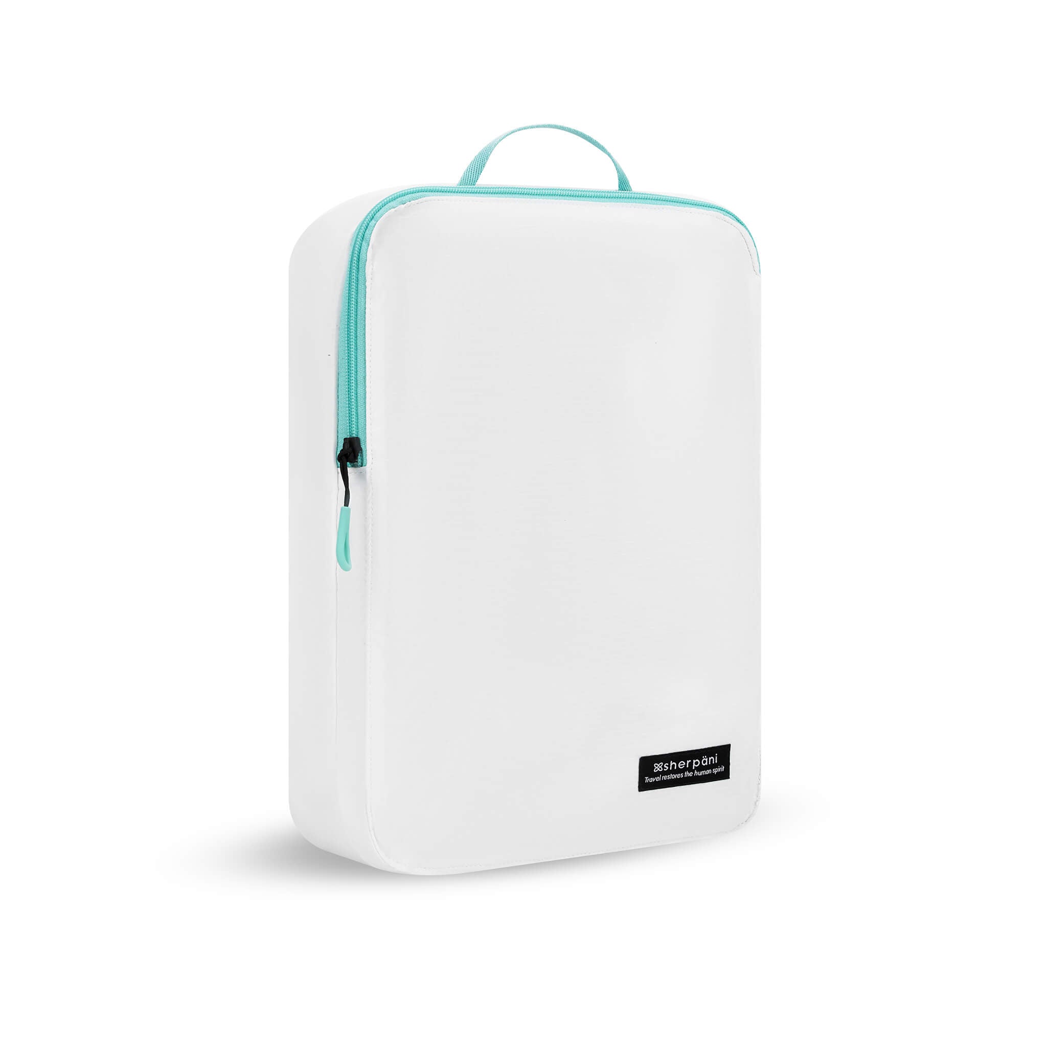 Angled front view of Compass Packing Cube in medium size. The cube is white with zipper and handle accented in aqua. 