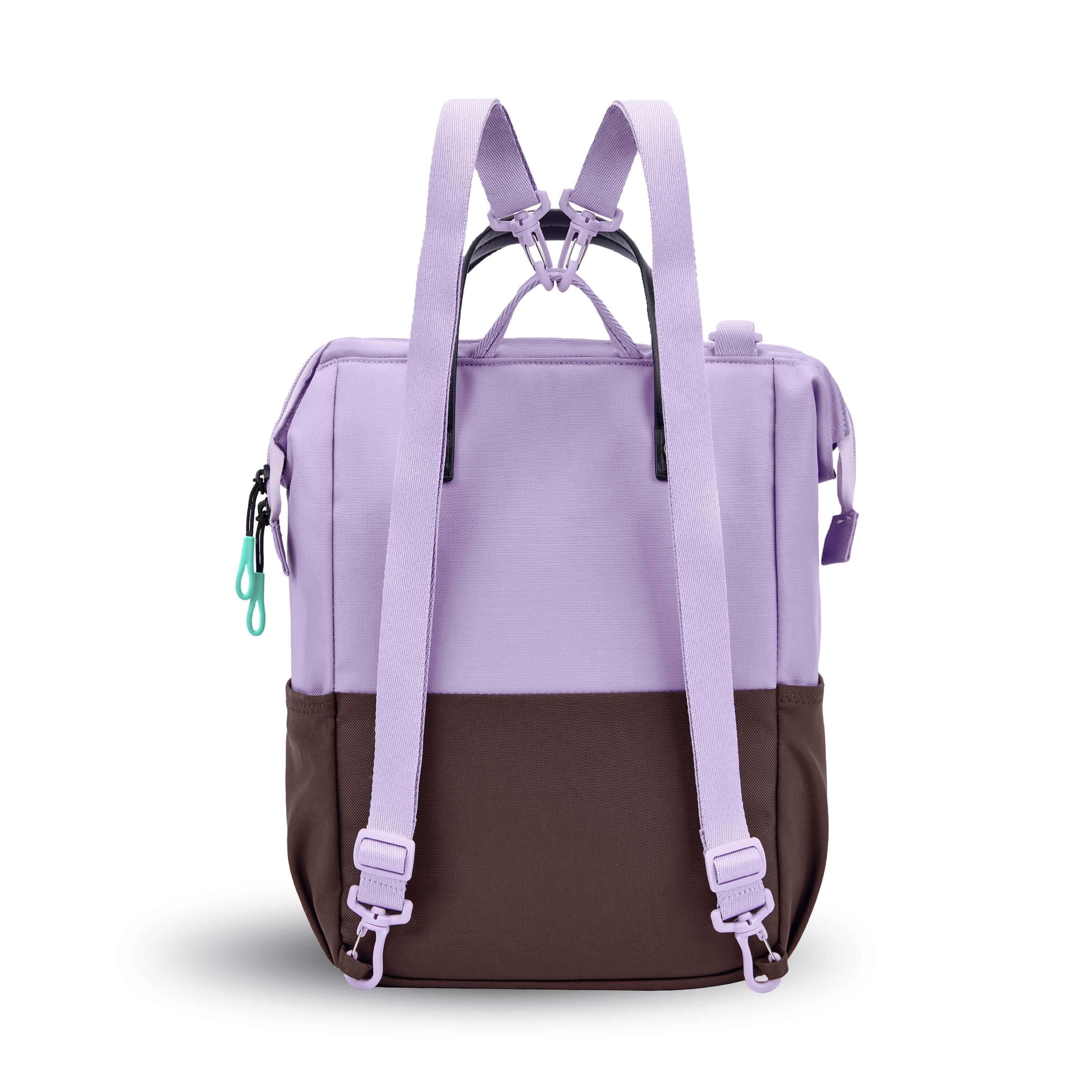 Back view of Sherpani three-in-one bag, the Dispatch in Lavender. The detachable straps are shown in the backpack style. 