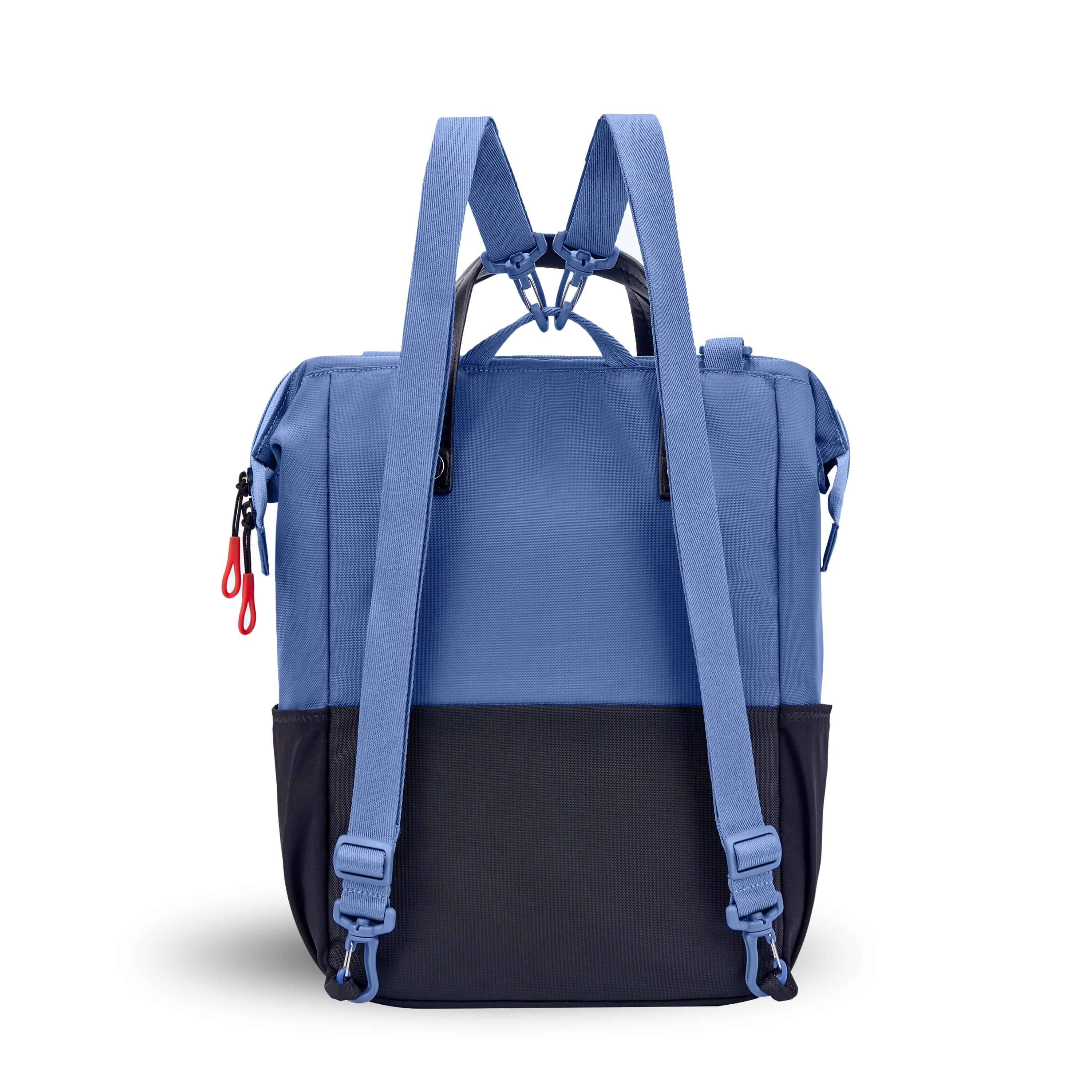 Back view of Sherpani three in one bag, the Dispatch in Pacific Blue. The detachable straps are shown in the backpack style. 