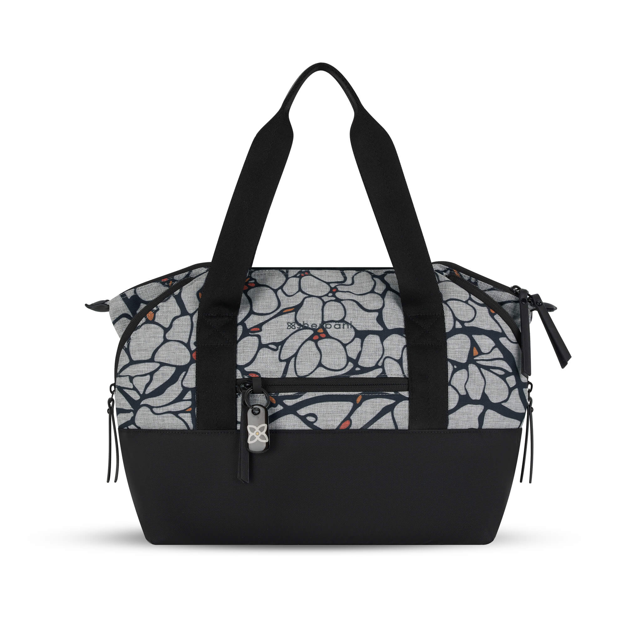 Flat front view of the Eclipse in Sakura. This travel tote features a zipper pocket in each corner which makes the Eclipse an expandable bag. This Anti-Theft purse is sustainably made from recycled materials including post consumer plastic and vegan leather. 