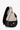 Angled front view of Sherpani's bag, the Esprit in Con Leche. The teardrop shaped bag is two-toned in black and beige. There is a small zipper pocket on the front of the bag, the main zipper compartment in the middle, and another zipper pocket towards the back of the bag. #color_con-leche
