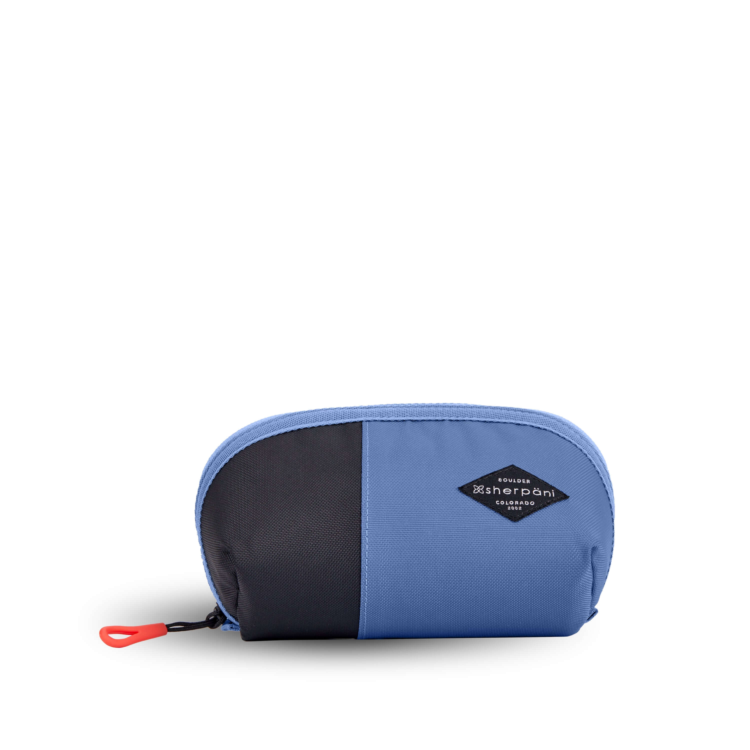 Flat front view of Sherpani travel accessory, the Harmony in Pacific Blue. The pouch is two toned in ocean blue and black. It has an easy pull zipper that is accented in red. 