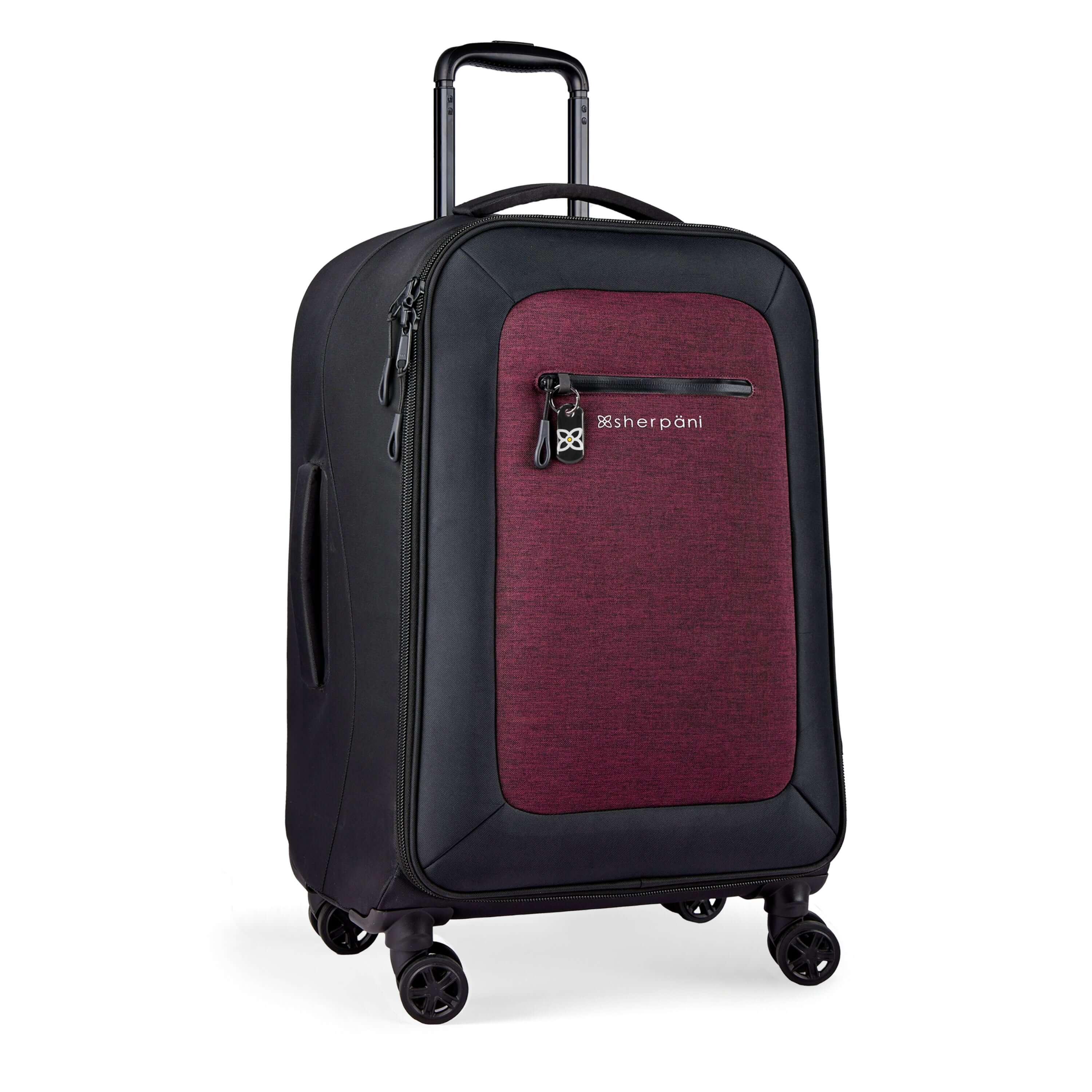 Angled front view of Sherpani’s Anti-Theft luggage the Hemisphere in Merlot. The suitcase has a soft shell exterior made from recycled plastic bottles and features vegan leather accents in black. There is a main zipper compartment and an external pocket on the front with a locking zipper and a ReturnMe tag. On the top of the suitcase sits a retractable luggage handle. On the top and side sit two easy-access handles. At the bottom are four 36-degree spinner wheels for smooth rolling. 