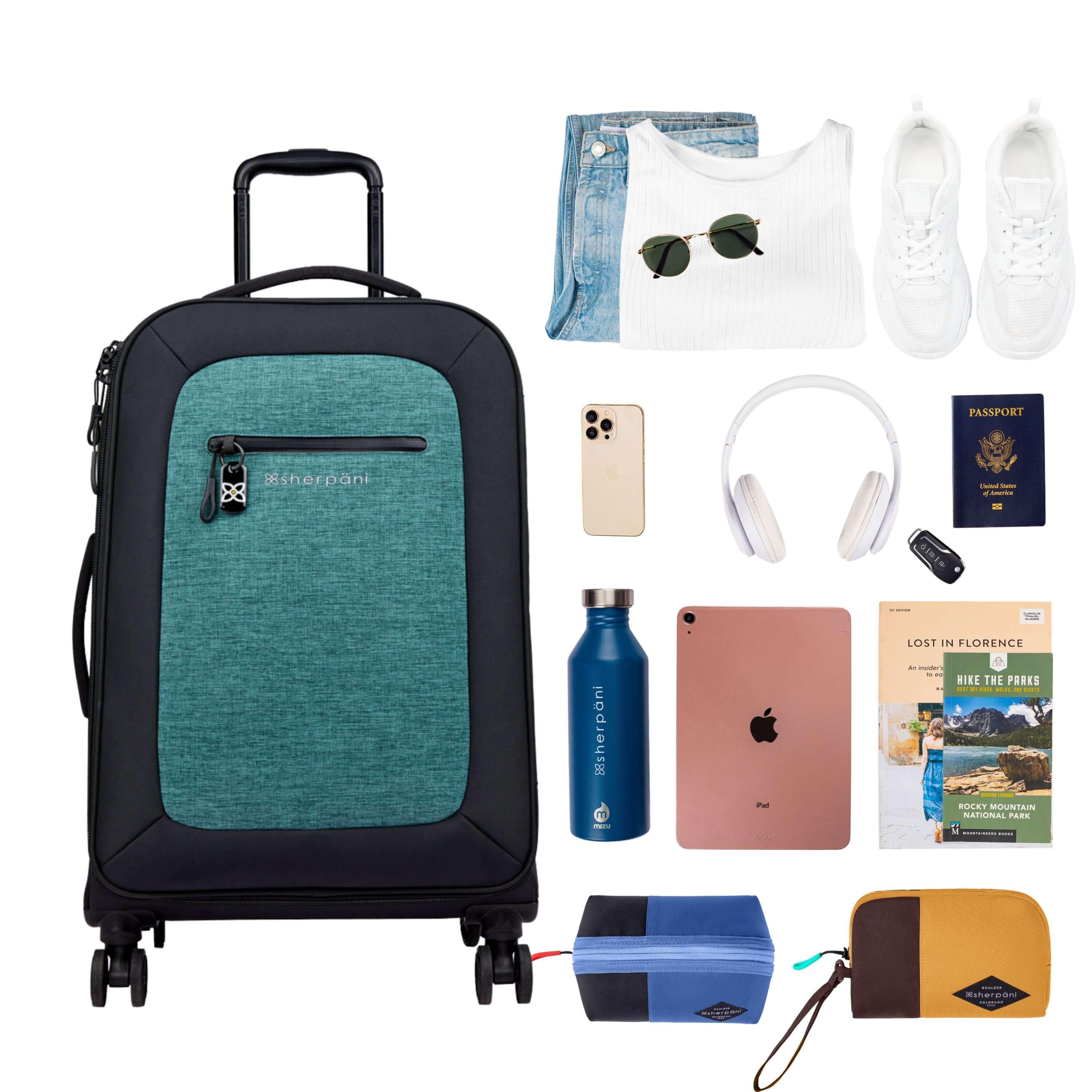 Top view of example items to fill the suitcase. On the left lies Sherpani’s Anti-Theft luggage, the Hemisphere in Teal. On the right lies an assortment of items: change of clothes, sunglasses, sneakers, phone, headphones, car key, passport, water bottle, tablet, travel books, Sherpani travel accessories, the Harmony in Pacific Blue and the Jolie in Sundial. 