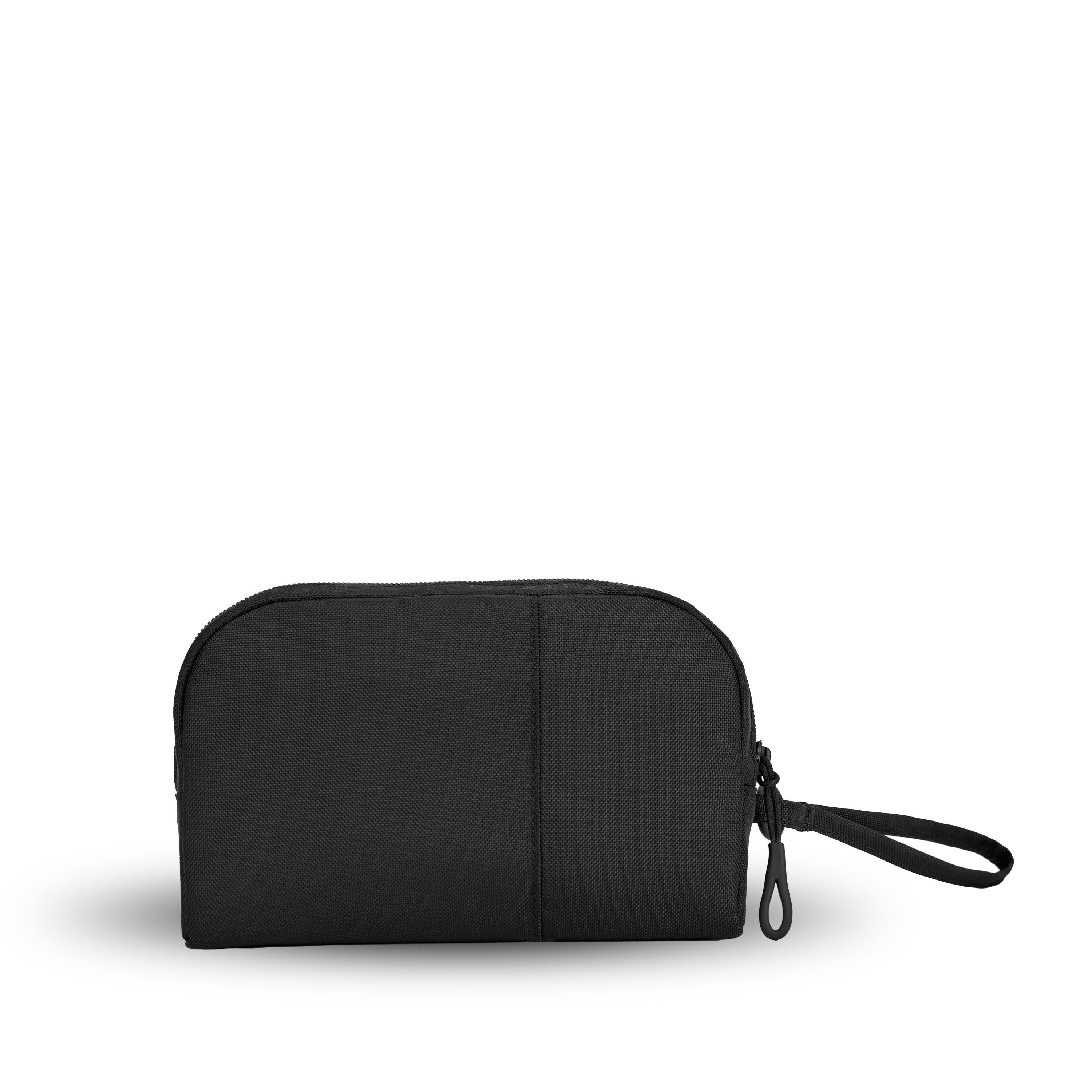 Back view of Sherpani travel accessory, the Jolie in Raven, in small size. The pouch is entirely black. It features a black wristlet strap and an easy-pull zipper accented in black. 