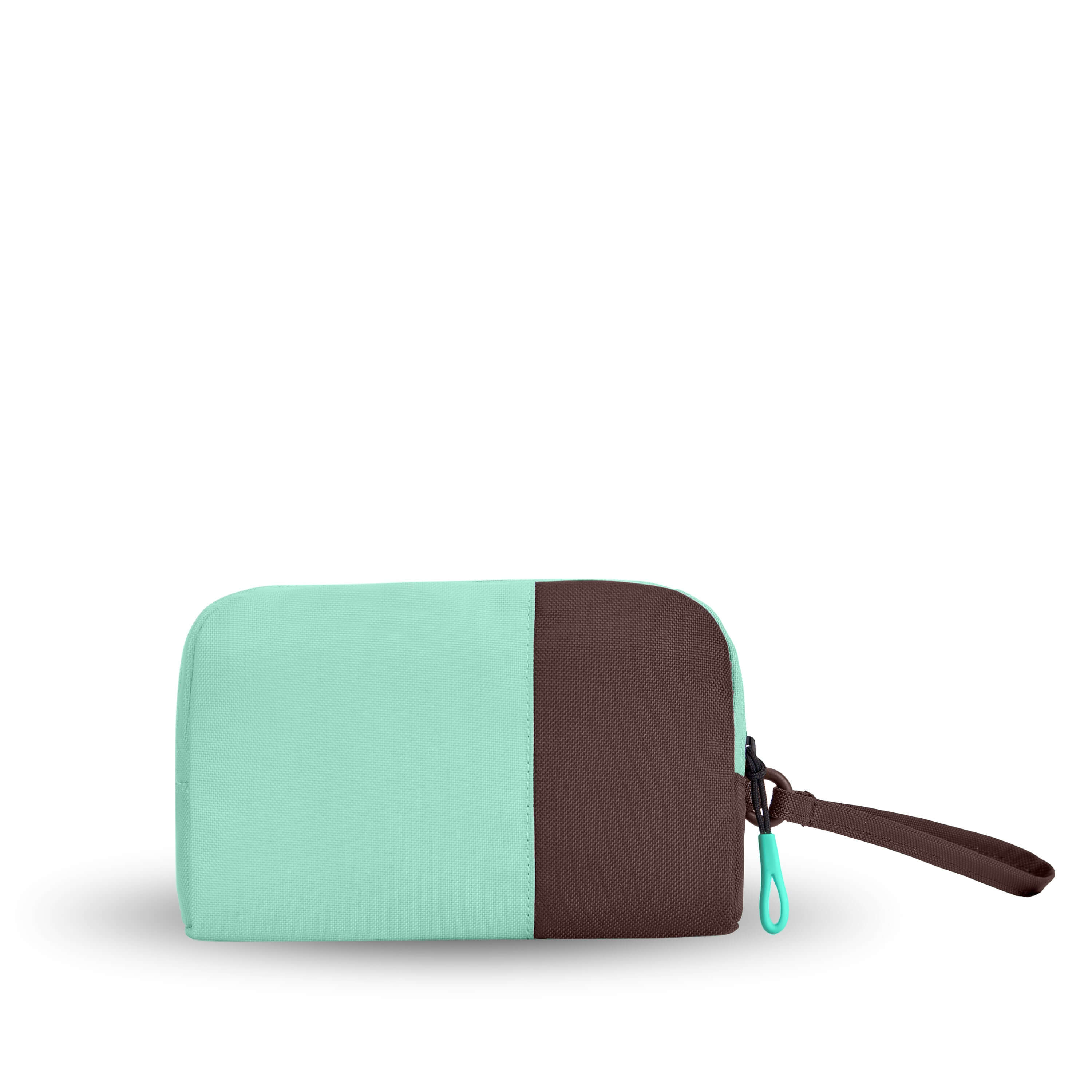 Back view of Sherpani travel accessory, the Jolie in Seagreen, in medium size. The pouch is two-toned in light green and brown. It features a brown wristlet strap and an easy-pull zipper accented in light green. 