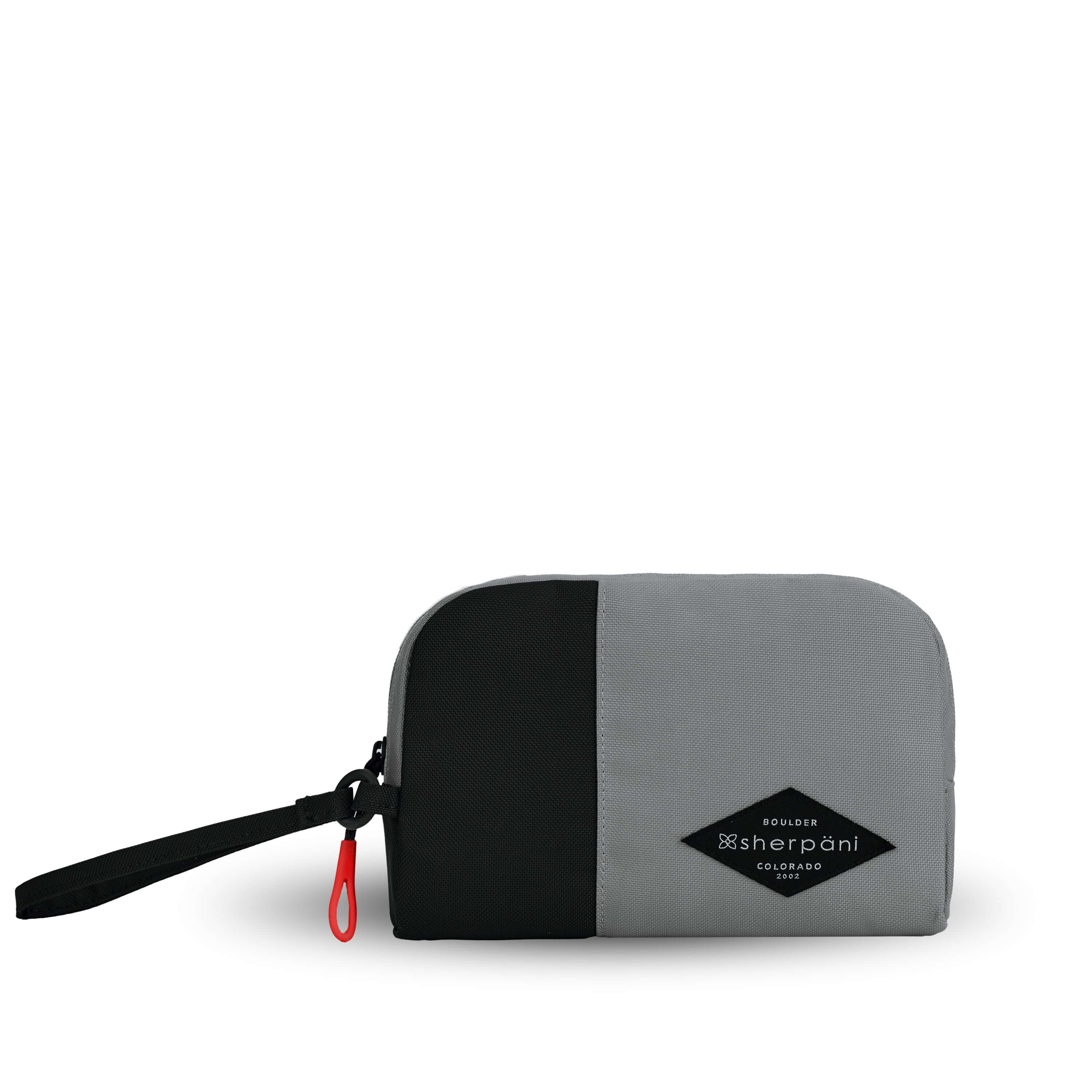 Flat front view of Sherpani travel accessory, the Jolie in Stone, in medium size. The pouch is two-toned in gray and black. It features a black wristlet strap and an easy-pull zipper accented in red. 