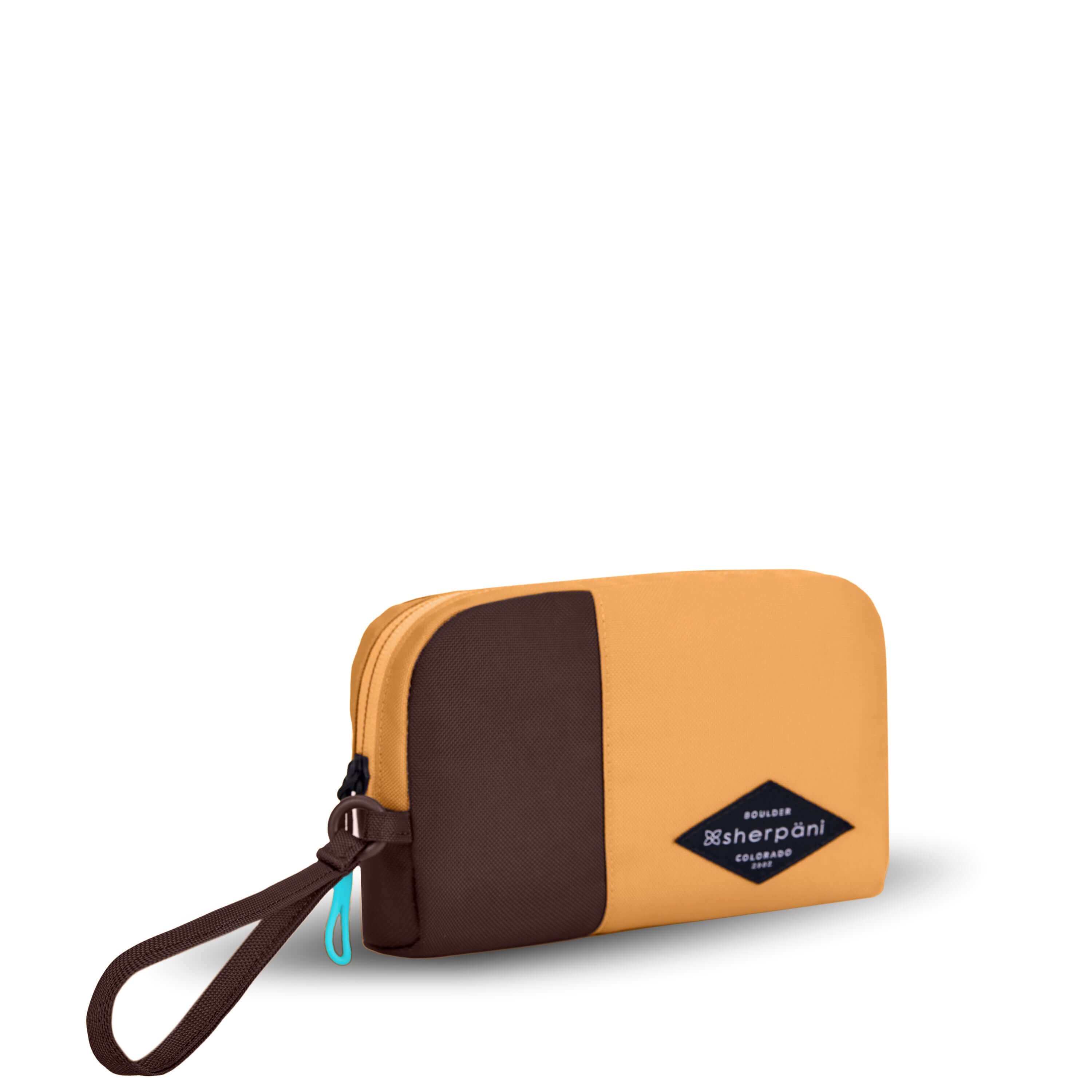 Angled front view of Sherpani travel accessory, the Jolie in Sundial, in small size. The pouch is two-toned in burnt yellow and brown. It features a brown wristlet strap and an easy-pull zipper accented in aqua. 