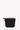 Back view of Sherpani crossbody, the Milli in Con Leche. The back of the bag is entirely black. #color_con-leche