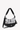 Angled front view of Sherpani's crossbody bag, the Mina in Magnolia. The half-moon silhouette bag is two-toned: the top is a white floral pattern accented by small red on a grey background, and the bottom is black. The main zipper compartment features an easy-pull zipper accented in white. The bag include an adjustable crossbody strap and a fixed shorten shoulder strap. A branded Sherpani keychain is clipped to a fabric loop on the top right corner. #color_magnolia