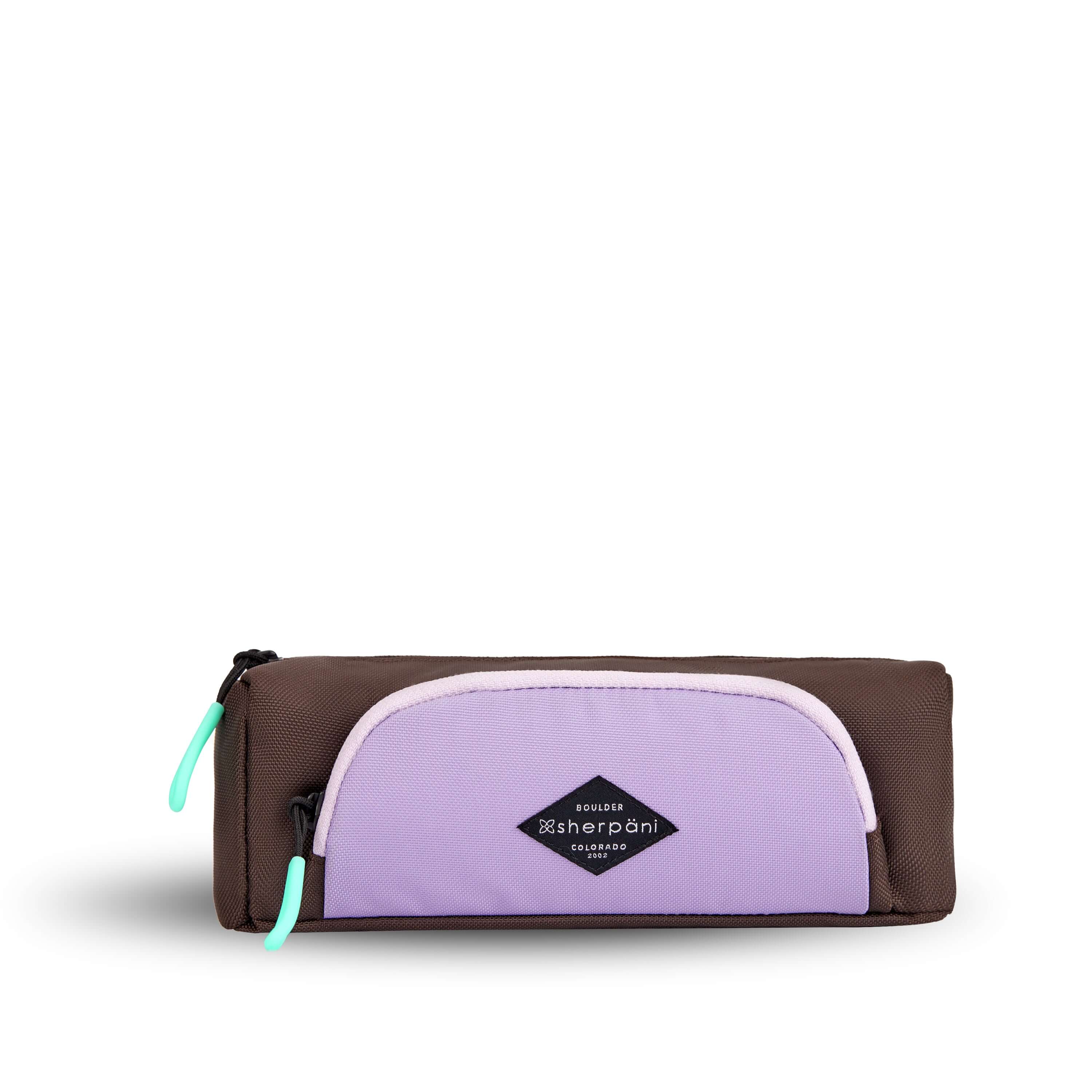 Flat front view of Sherpani travel accessory, the Poet in Lavender. The pouch is two-toned in lavender and brown. There is an external zipper pocket on the front. Easy-pull zippers are accented in aqua. 