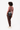 Model wearing the Sherpani sling bag, the Prima AT in Sterling across her back with her body facing away from the camera. #color_sterling-metal