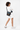 Model smiling over her right shouder, wearing the Sherpani crossbody, the Sadie in Chromatic. #color_chromatic