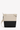 Back view of Sherpani's crossbody, the Sadie in Con Leche. The bag is two-toned in black and beige. There is an external pocket on the back. A zipper pocket sits on one side with an easy-pull zipper. The bag has an adjustable crossbody strap. #color_con-leche