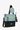 Angled front view of Sherpani's crossbody, the Sadie in St. Lucia. The top half of the bag is aqua blue accented by a light green trim and the bottom half of the bag is black. It features two exterior zipper pockets on the front panel with easy-pull zippers. A Sherpani branded keychain is attached to a fabric loop in the upper right corner. It has an adjustable crossbody strap. #color_st-lucia