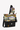Angled front view of Sherpani's crossbody, the Sadie in Ventura '73.The top half is multicolor wavy stripe pattern and the bottom half is black. It features two exterior zipper pockets on the front panel with an easy-pull zipper accented in mustard yellow and lavender trim. A Sherpani branded keychain is attached to a fabric loop in the upper right corner. It has an adjustable crossbody strap. #color_ventura-73