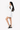 Model carries Sherpani purse, the Skye in Chromatic, as a shoulder bag. #color_chromatic