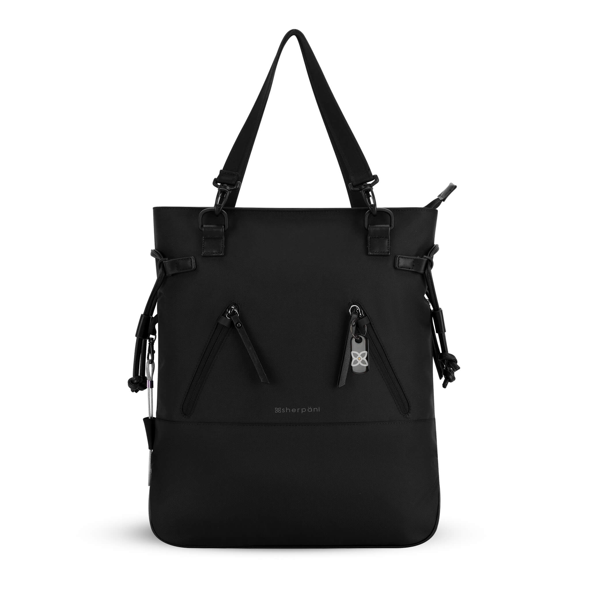 Flat front view of Sherpani Anti-Theft tote backpack, the Tempest in Carbon. The convertible bag includes RFID protection, locking zipper pockets, adjustable straps, and a trolley sleeve. 