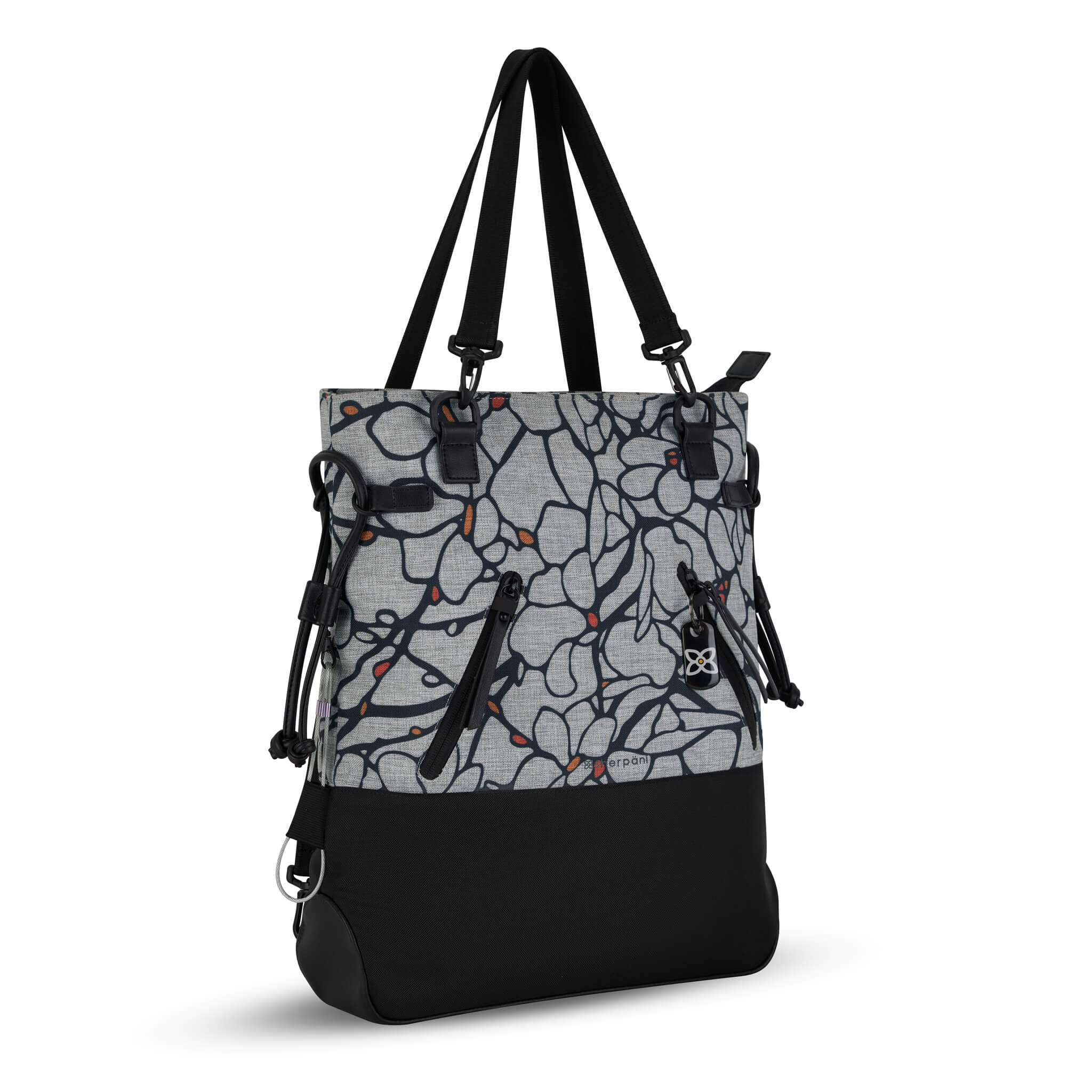 Angled front view of the Sherpani Anti-Theft tote backpack, the Tempest in Sakura. The convertible bag includes RFID protection, locking zipper pockets, adjustable straps, and a trolley sleeve. 