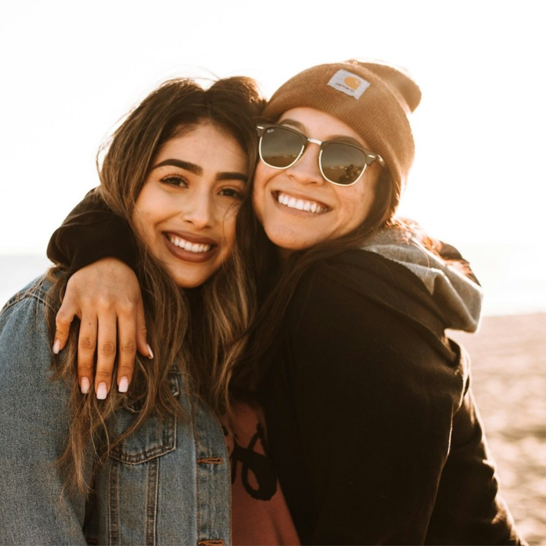 Two female friends on the beach