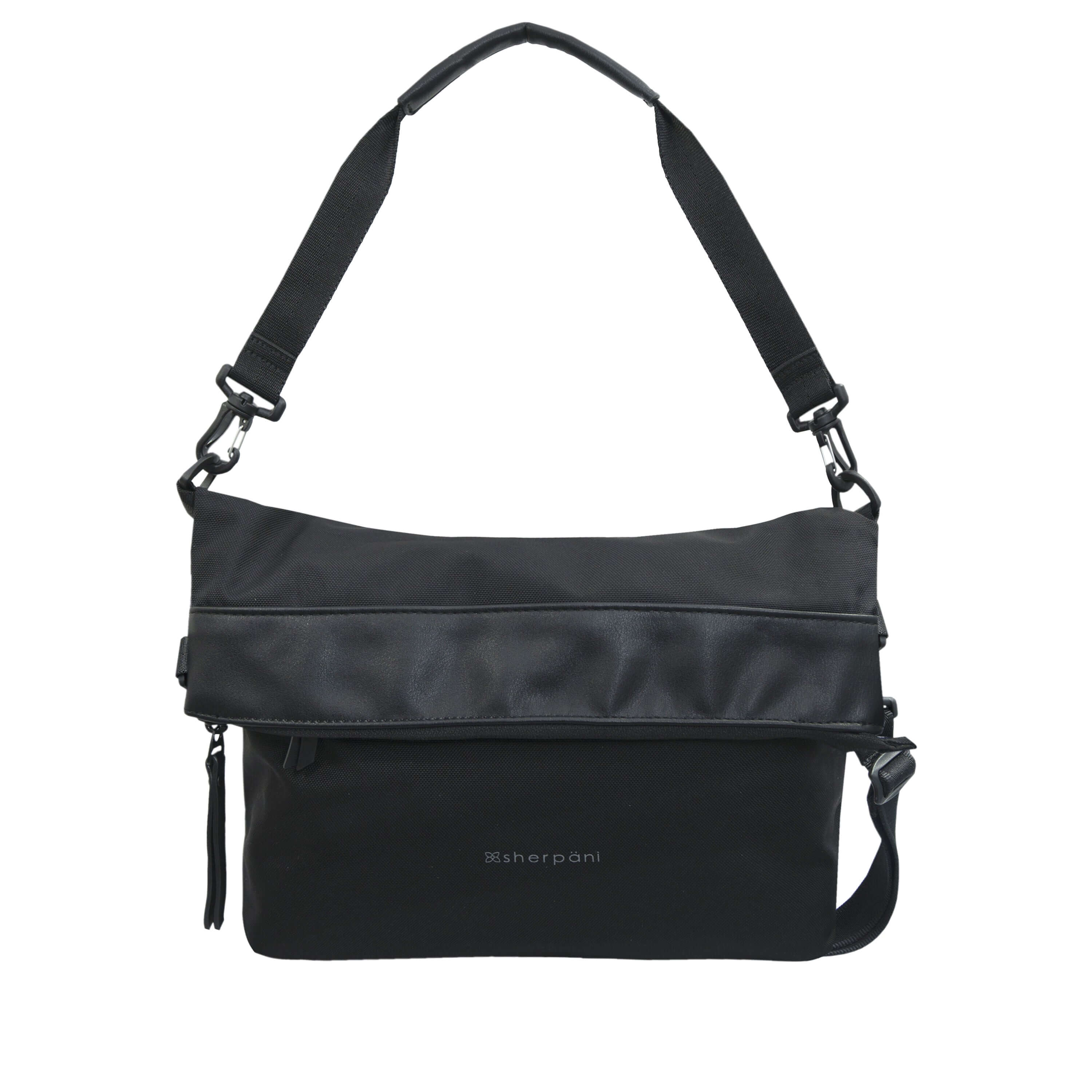 Flat front view of Sherpani&#39;s Anti-Theft bag, the Vale AT in Carbon with vegan leather accents in black. The top is folded over creating a reversible overlap. It has an adjustable/detachable crossbody strap, and a second detachable strap fixed at a shorter length.