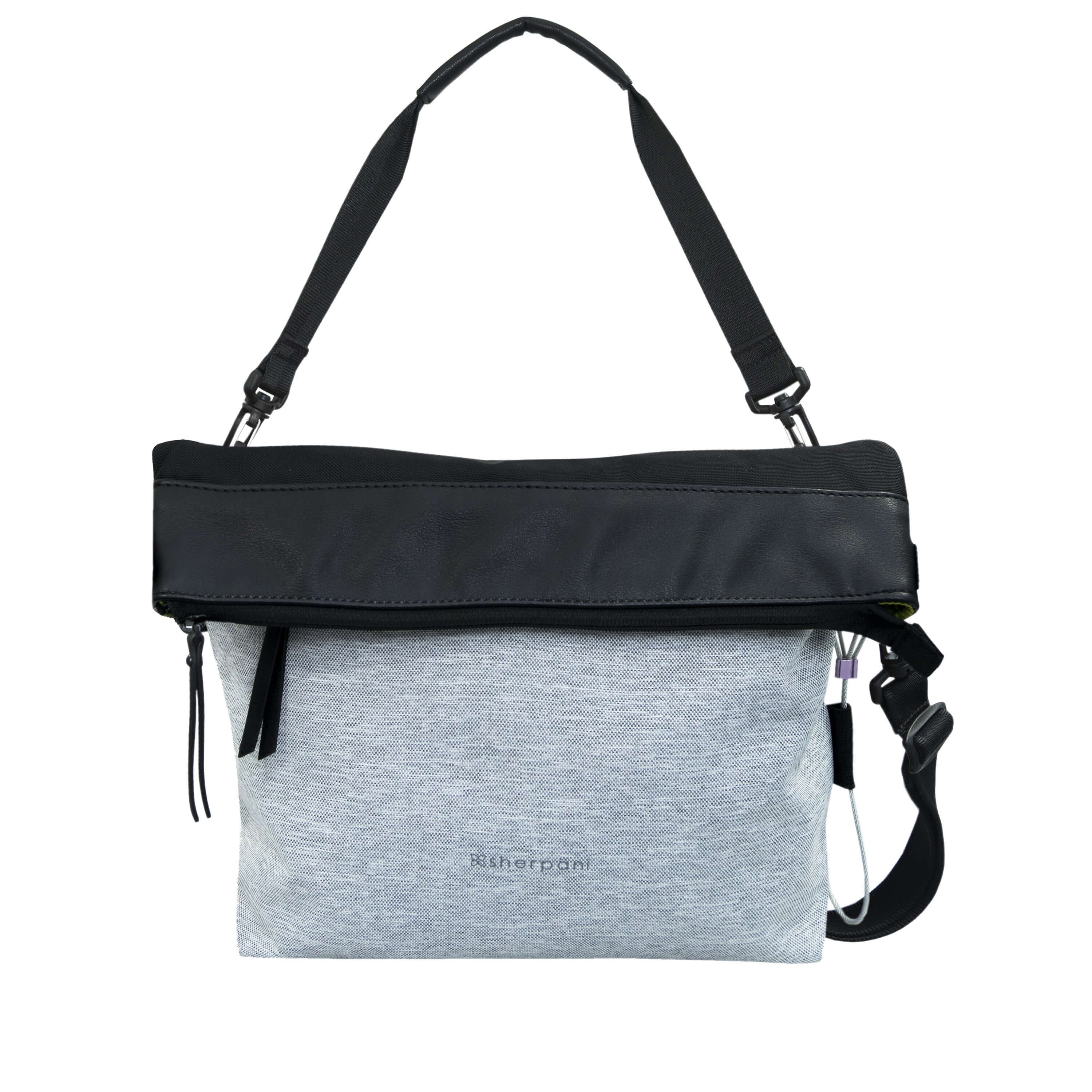  Flat front view of Sherpani&#39;s Anti-Theft bag, the Vale AT in Sterling with vegan leather accents in black. The top is folded over creating a two-toned reversible overlap. A chair loop lock is clipped onto one side, secured in place by an elastic tab. It has an adjustable/detachable crossbody strap, and a second detachable strap fixed at a shorter length.