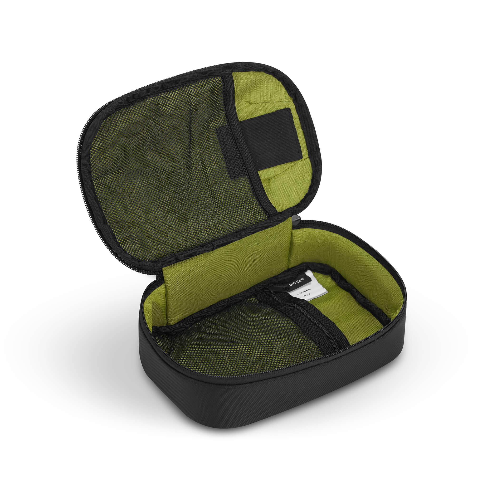 Inside view of Sherpani travel accessory the Atlas. The interior of the case is lime green, mesh pockets sit on either side. 