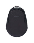 Flat front view of Sherpani's Anti-Theft backpack, the Presta in Black. The backpack has a teardrop shape. There is an external zipper compartment on either side of the bag and an easy-access handle sits on the top.