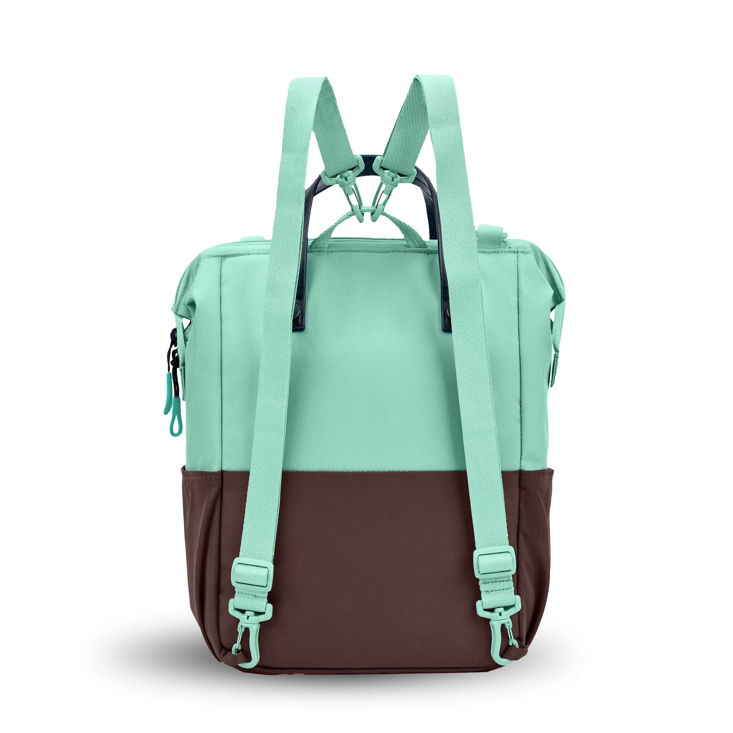 Back view of Sherpani three-in-one bag, the Dispatch in Seagreen. The detachable straps are shown in the backpack style.