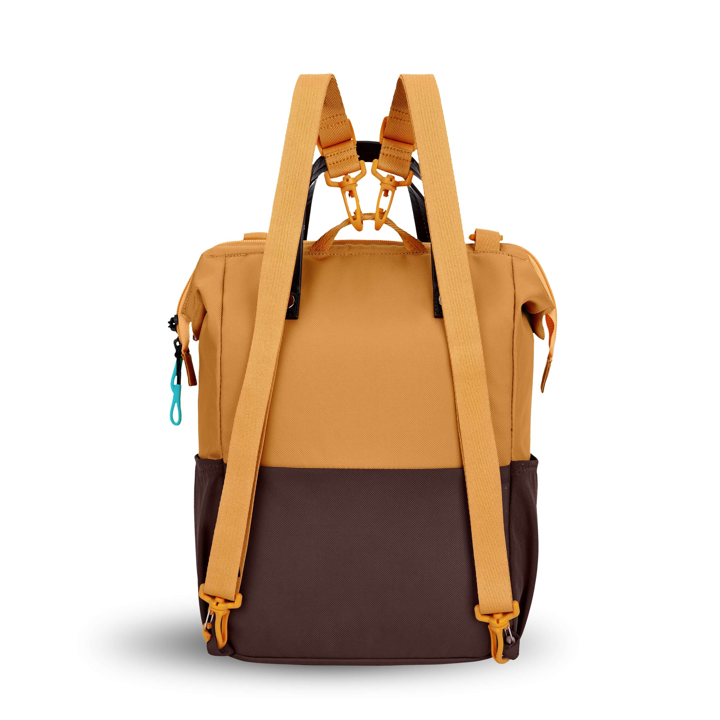 Back view of Sherpani three-in-one bag, the Dispatch in Sundial. The detachable straps are shown in the backpack style. 