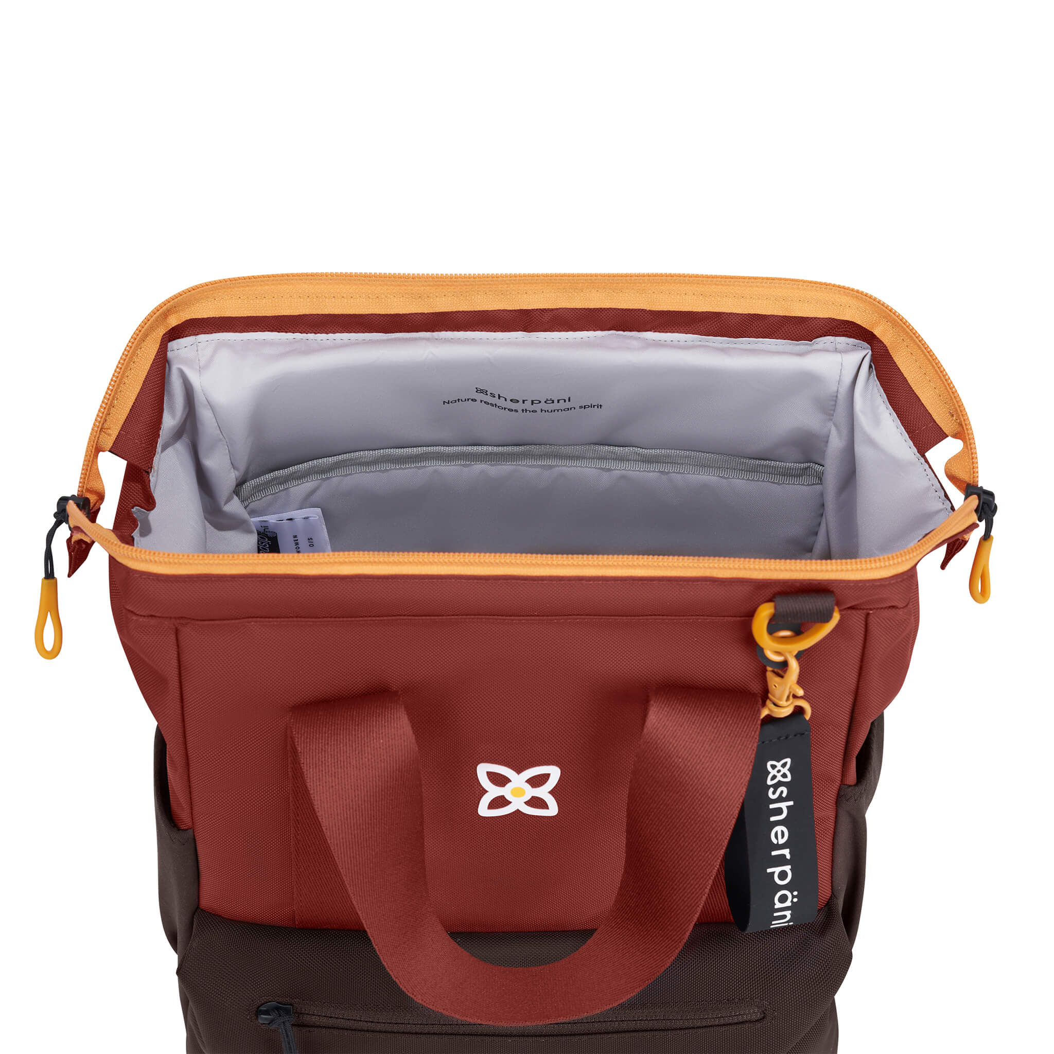 Inside view of Sherpani travel bag, the Dispatch. The main bag compartment features a rectangular frame and doctor bag style opening so you can see right to the bottom. 