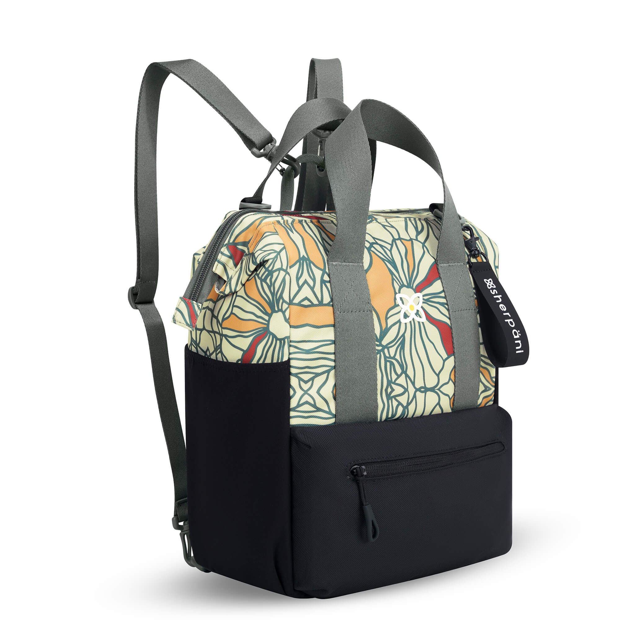 Angled front view of Sherpani convertible travel bag, the Dispatch in Fiori. Dispatch features include external zipper pocket, three water bottle holders, fixed tote handles, removable straps, detachable straps, adjustable straps, padded laptop sleeve and a doctor bag opening. The Fiori colorway is two-toned in black and a floral pattern with red accents.