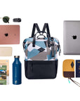 Top view of example items to fill the bag. Sherpani three-in-one bag, the Dispatch in Summer Camo, lies in the center. It is surrounded by an assortment of items: sunglasses, car key, laptop, phone, travel guidebooks, water bottle, laptop, passport and Sherpani travel accessory the Jolie in Sundial.