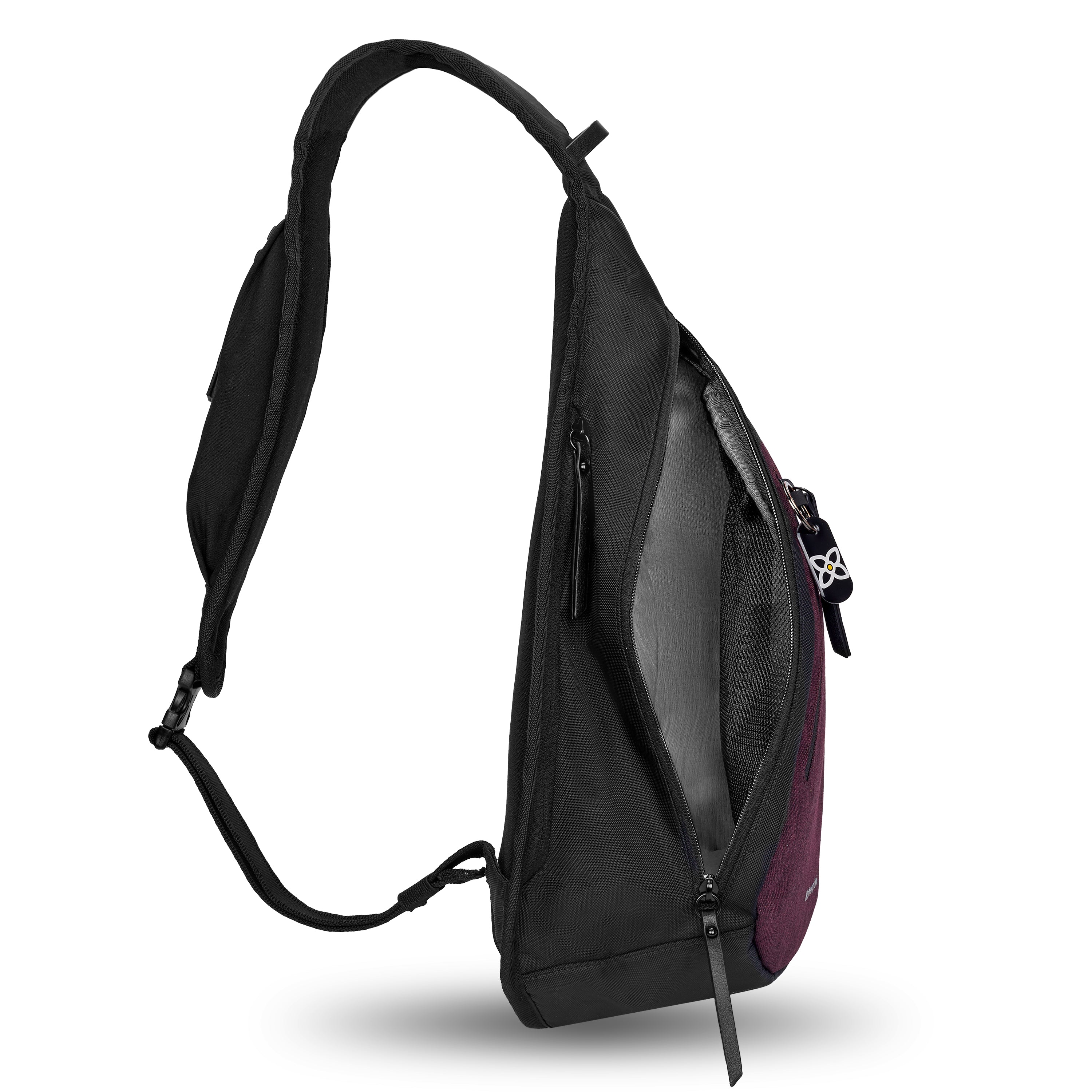 Side view of Sherpani’s Anti-Theft bag, the Esprit AT in Merlot, with vegan leather accents in black. The main zipper compartment is open to reveal a lime pale blue. 