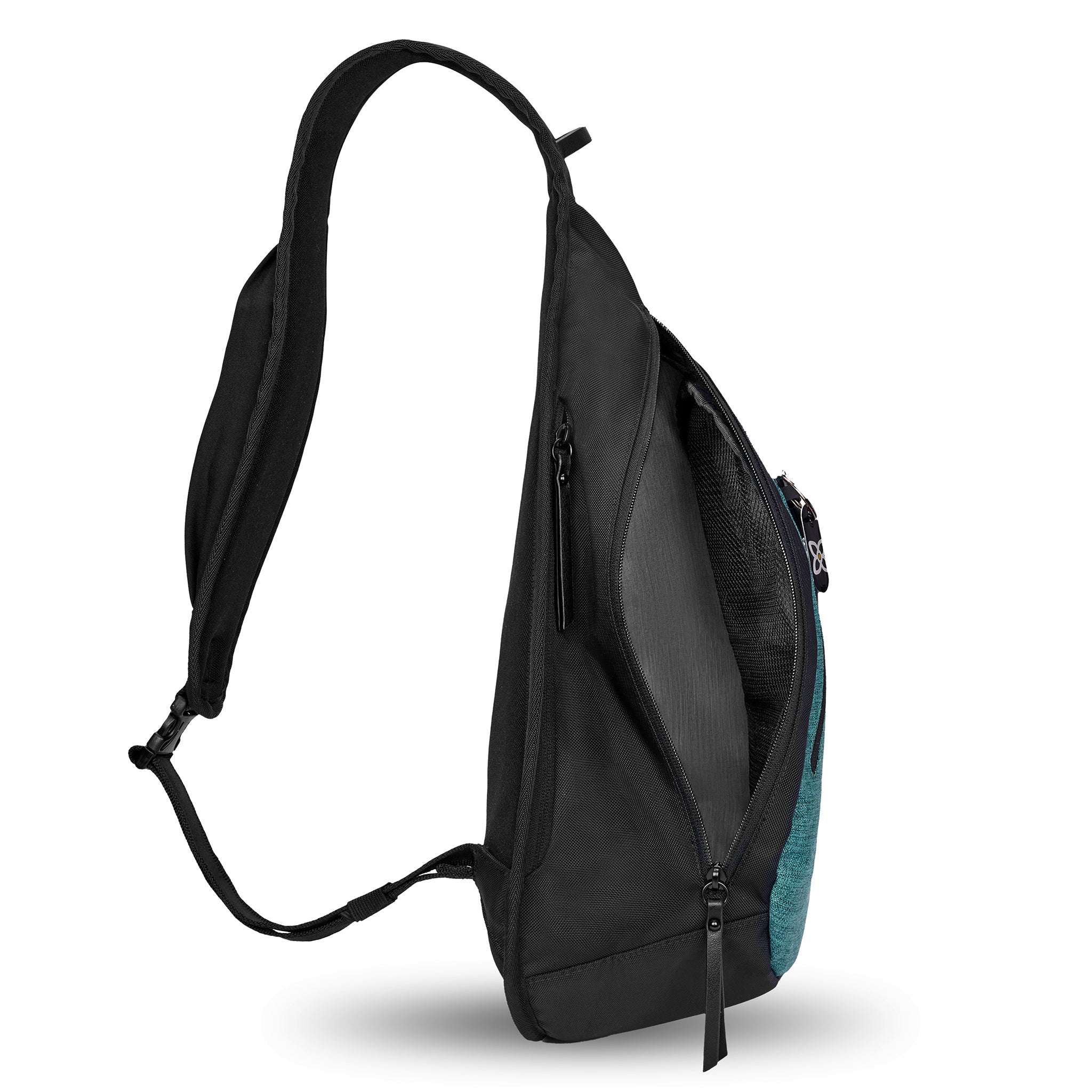Side view of Sherpani’s Anti-Theft bag, the Esprit AT in Teal, with vegan leather accents in black. The main zipper compartment is open to reveal a pale blue interior. 