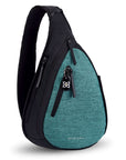 Angled front view of Sherpani's Anti-Theft bag, the Esprit AT in Teal, with vegan leather accents in black. There is a locking zipper compartment on the front, and two more zipper compartments on the side. An elastic water bottle holder sits on the other side of the bag.