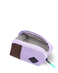 Top view of Sherpani travel accessory the Harmony in Lavender. The pouch is unzipped to reveal a light gray interior.