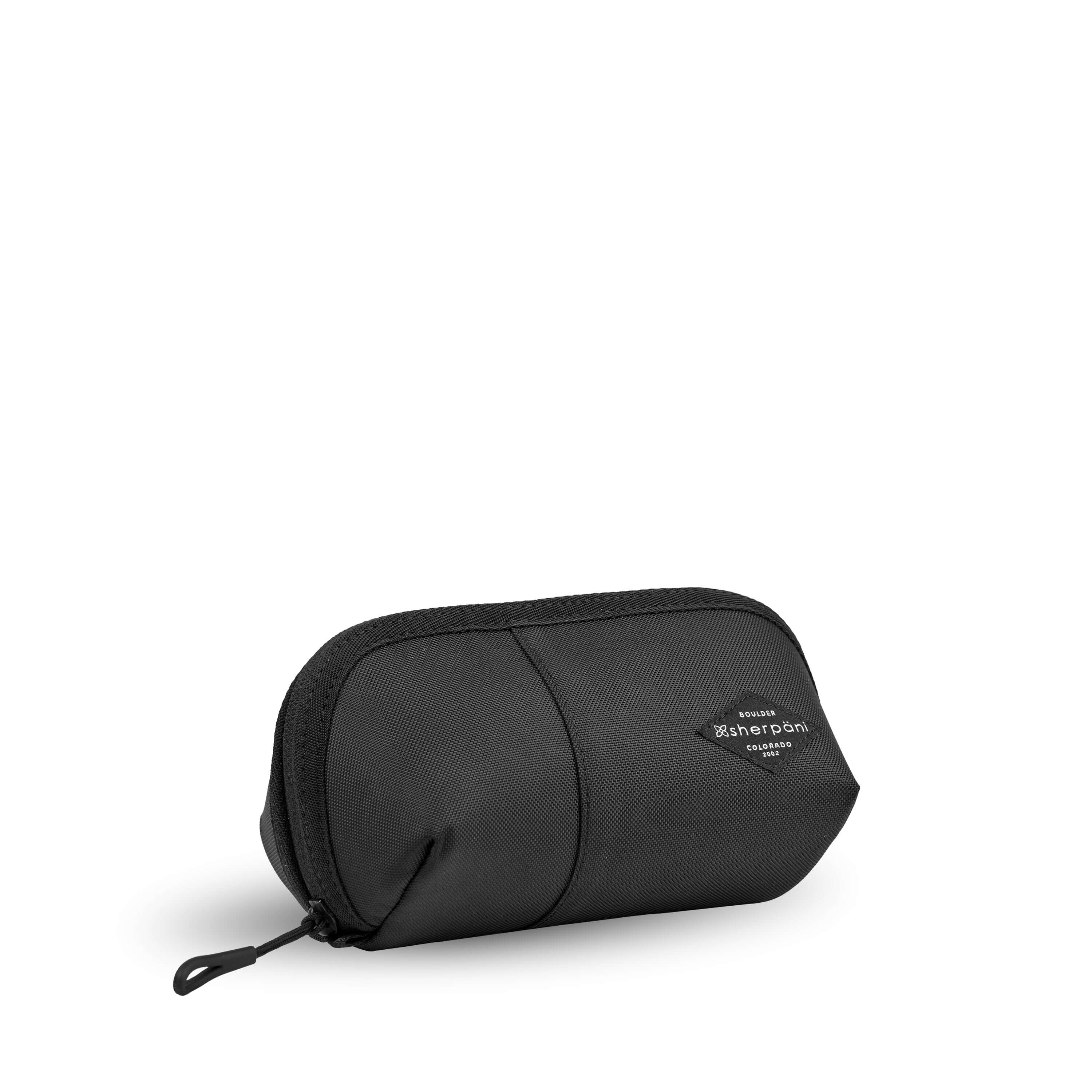 Angled front view of Sherpani travel accessory, the Harmony in Lavender. The pouch is entirely black. It has an easy-pull zipper that is accented in black.