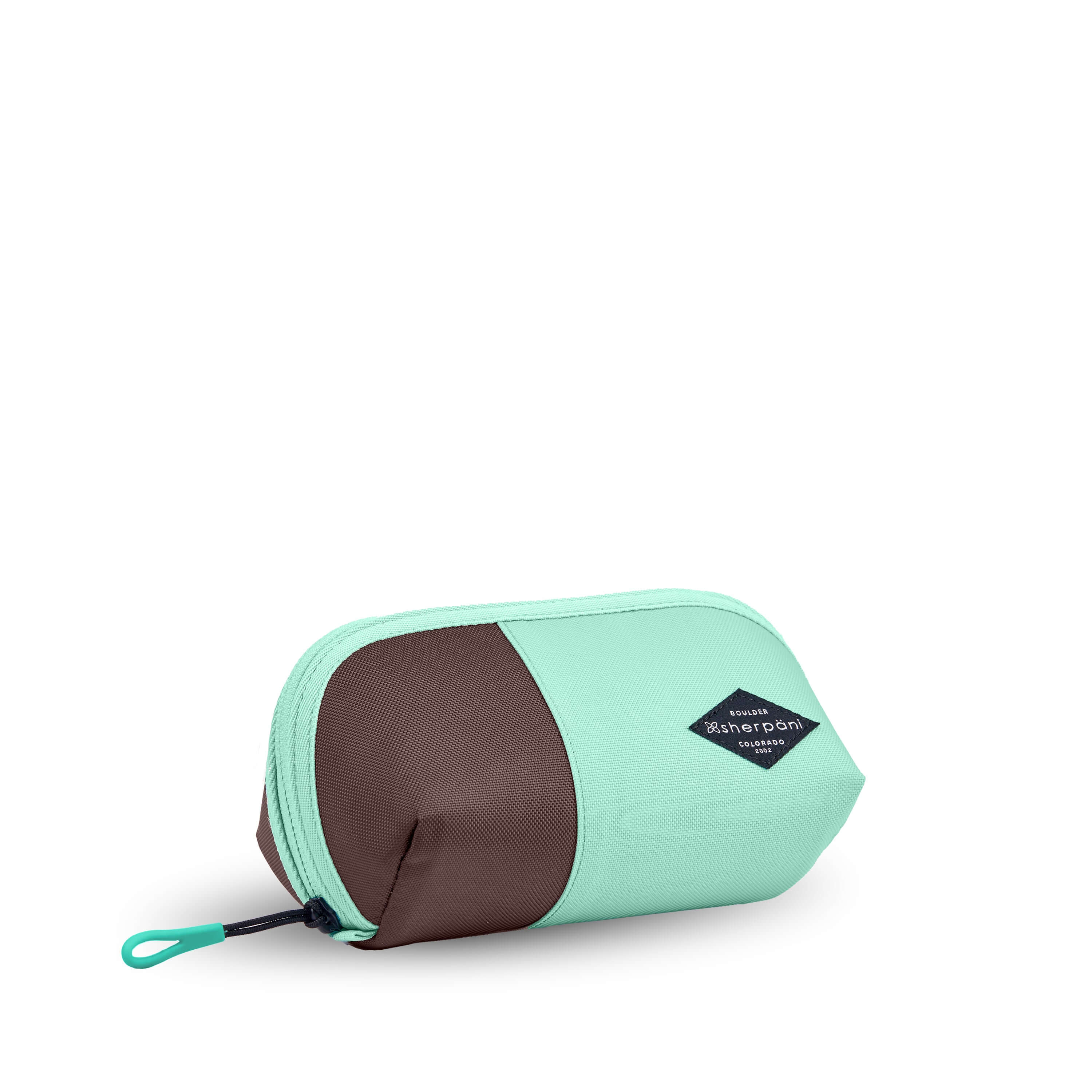 Angled front view of Sherpani travel accessory, the Harmony in Seagreen. The pouch is two-toned in light green and brown. It has an easy-pull zipper that is accented in light green. #color_seagreen
