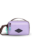 Flat front view of Sherpani’s fanny pack, the Hyk in Lavender. The bag is two-toned, the front half is lavender and the back half is brown. There is an external zipper pocket on the front of the bag. Easy-pull zippers are accented in aqua. The fanny pack features an adjustable strap with a buckle.