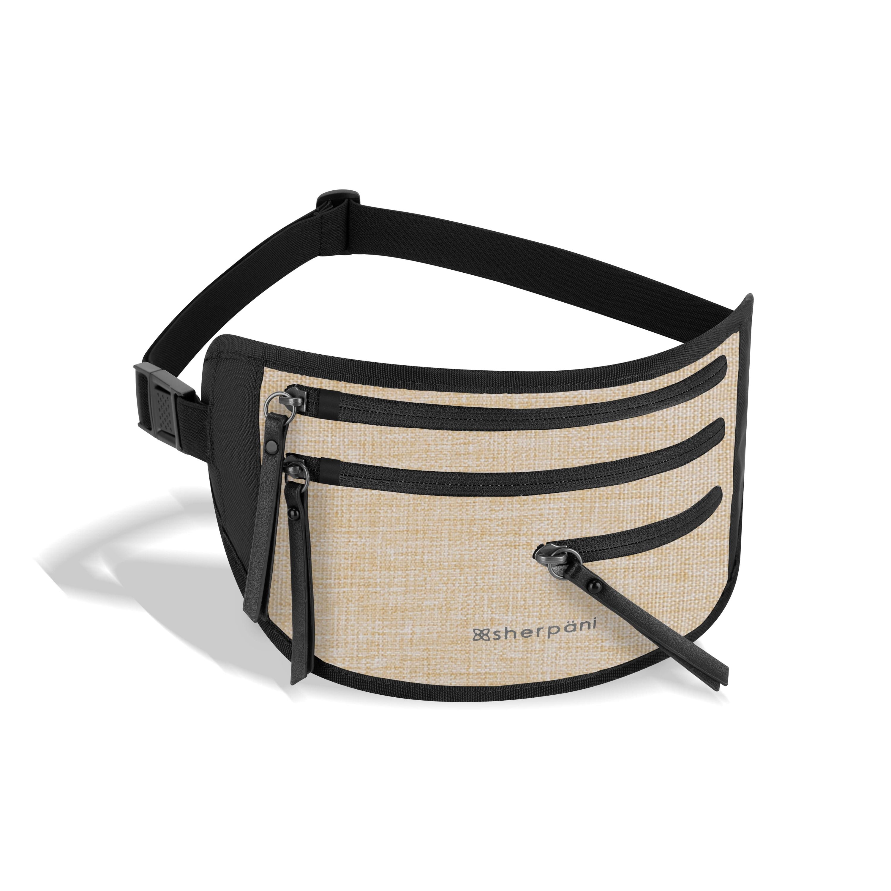 Angled front view of the Jett in Straw. This convenient travel belt has lockable zippers and RFID protection, it makes the perfect hiding spot for your passport and other travel essentials. #color_straw