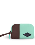 Flat front view of Sherpani travel accessory, the Jolie in Seagreen, in small size. The pouch is two-toned in light green and brown. It features a brown wristlet strap and an easy-pull zipper accented in light green.