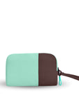 Back view of Sherpani travel accessory, the Jolie in Seagreen, in medium size. The pouch is two-toned in light green and brown. It features a brown wristlet strap and an easy-pull zipper accented in light green.