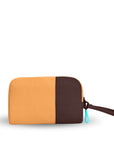 Back view of Sherpani travel accessory, the Jolie in Sundial, in medium size. The pouch is two-toned in burnt yellow and brown. It features a brown wristlet strap and an easy-pull zipper accented in aqua.